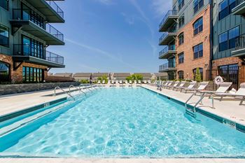 Resort-Style Swimming Pool with Sundeck for Lounging